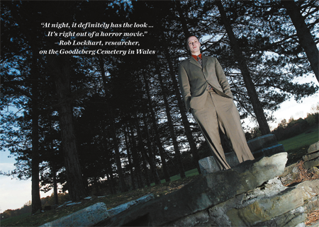 Man standing in cemetery