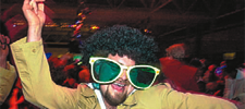 Man dancing with green glasses Disco style